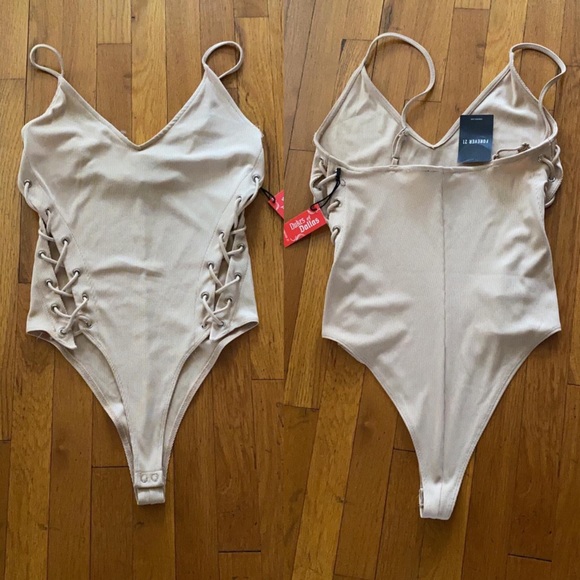 Forever 21 Tops - Nude high leg ribbed side tie lace up bodysuit